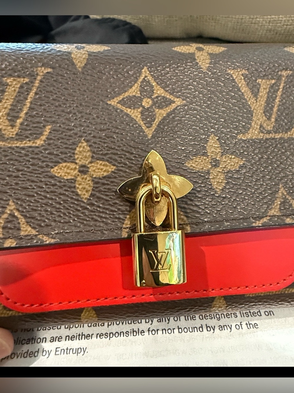 🌟Louis Vuitton Monogram Flower
Lock Wallet with Red accents🌟 (Authenticated) - Picture 9 of 10